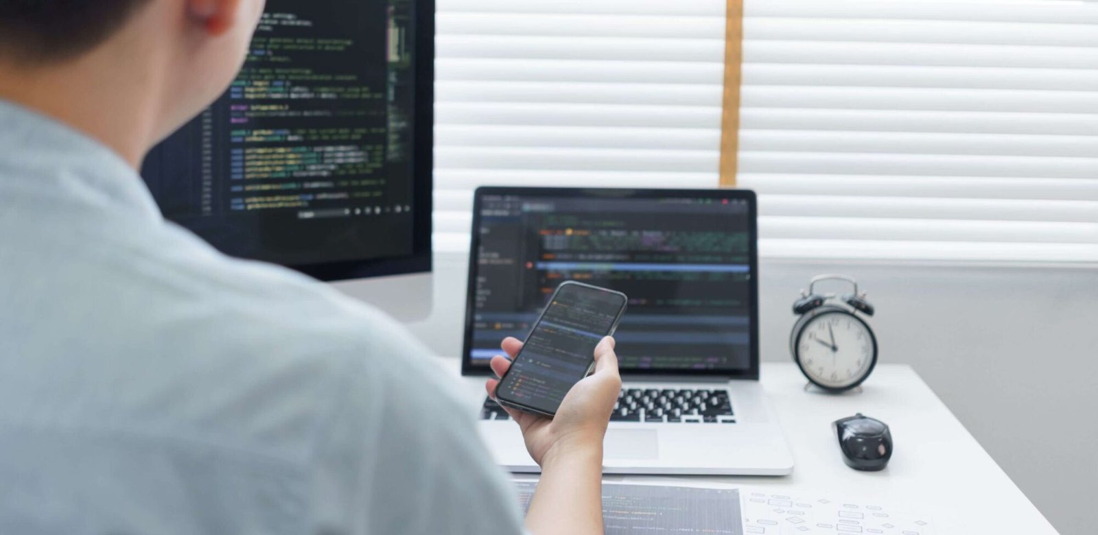 Introduction to Web and Mobile Development for Startup Founders software development concept male programmer check h8n29xu