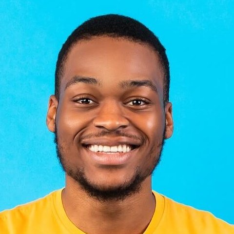 happy african american guy sitting with laptop ove 2022 12 16 07 15 19 utc cropped.jpg